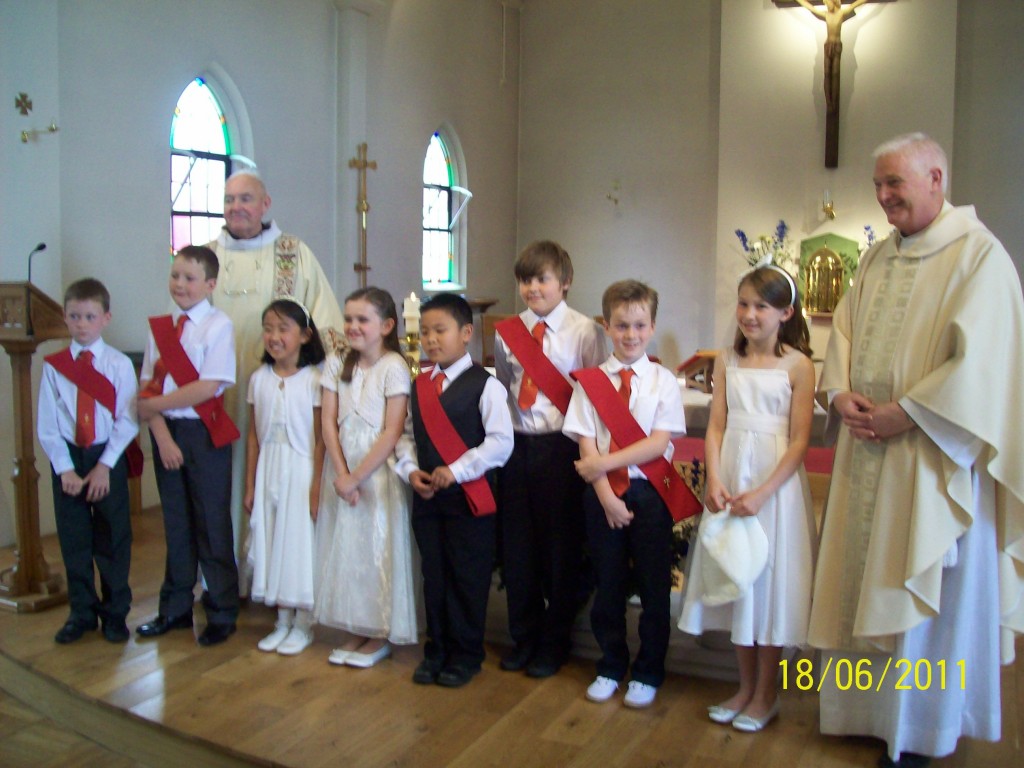 Children from Holy Angels on their First Holy Communion on 18th June 2011